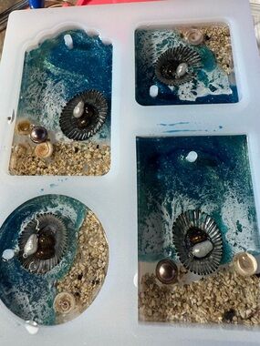 Hawaiian key Chains with island pearls, puka shells, opihi and sand. $25 each